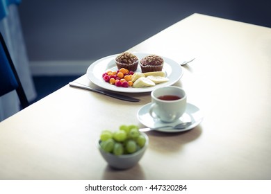 Breakfast on a table in a wide angle at home