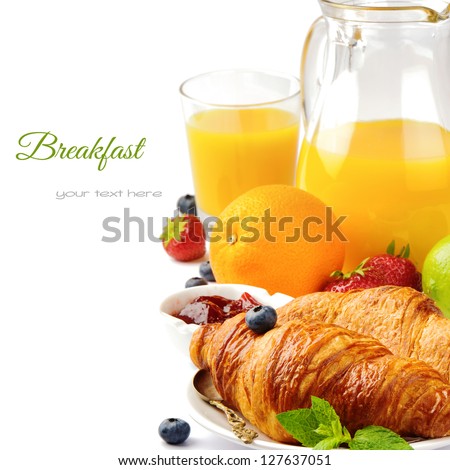 Breakfast with orange juice and fresh croissants