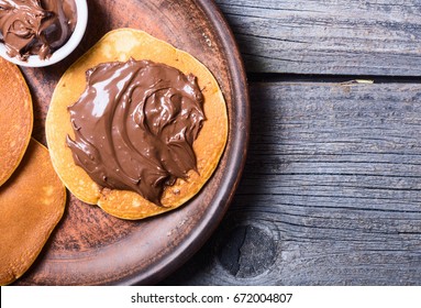 Breakfast . Pancakes With Chocolate Spread Nutella . Top View