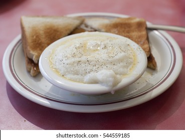 Breakfast Plate Of Toast And Grits