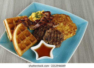 Breakfast Platter With Bacon, Hash Brown, Beef Burger Patty, Scrambled Egg And Waffles