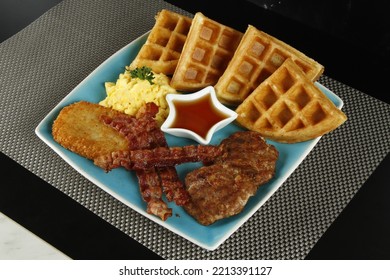 Breakfast Platter With Bacon, Hash Brown, Beef Burger Patty, Scrambled Egg And Waffles