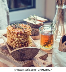 breakfast in a rustic style - waffles with tea