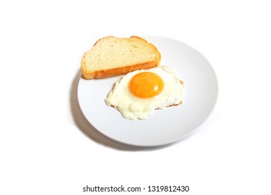 Breakfast Scrambled Fried Eggs Omelet With Toast On The Plate Isolated On White Background