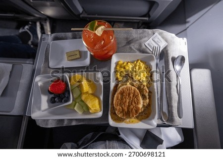 Breakfast served for first class on a morning flight.