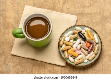 Breakfast For A Supplement Junkie - Vitamin Pills, Capsules And Tablets In A Small Bowl With A Cup Of Coffee - Healthy Lifestyle, Overdose Or Addiction Concept