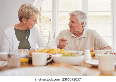 Breakfast, talking and lunch with senior couple, eating and happy together in a home. Love, support and care on a dining room with a smile and food with bonding in the morning with fruit in house - Powered by Shutterstock