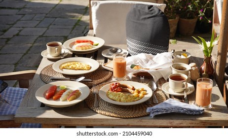 Breakfast with tea and food on a sunny morning in a hotel in Kathmandu, Nepal.