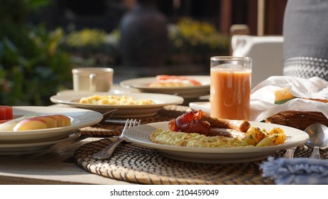 Breakfast with tea and food on a sunny morning in a hotel in Kathmandu, Nepal.