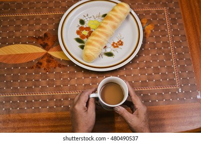Breakfast time with coffee and bread