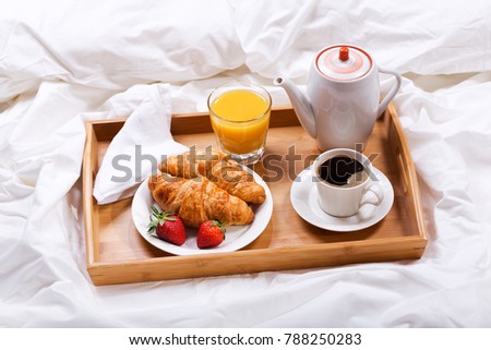 Similar – Hotcakes with fruit and coffee in bed