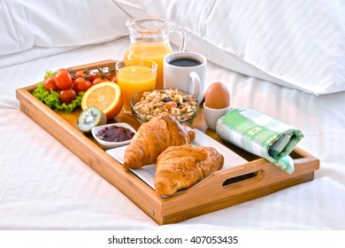 Breakfast Tray In Bed In Hotel Room. 