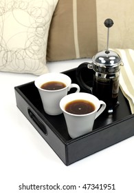 A breakfast tray with fresh coffee