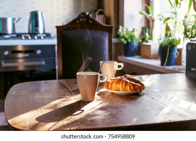 breakfast for two person with cup of hot coffee and fresh croissants
 - Powered by Shutterstock