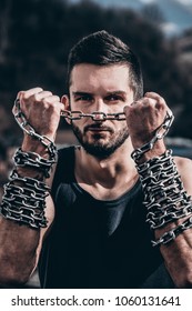 Breaking The Chains. Motivational Image. Very Sharp Image Full Of Details. Strong Man.