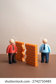 Breaking down the wall of misunderstanding between the parties and a chance to resolve the conflict. Reconciliation and open dialogue. Conflict resolution and partnership recovery concept.