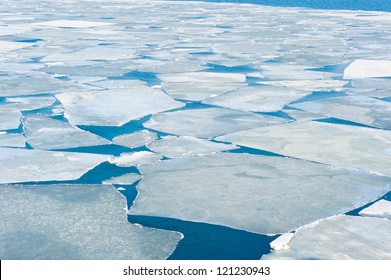 Breaking Spring Ice Floe At The Sea