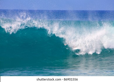 Breaking Waves On A Beach In Hawaii