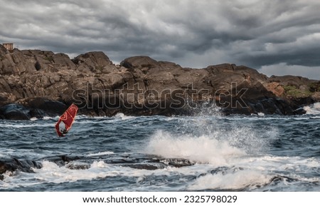 Breaking waves and splish splash for the windsurfer