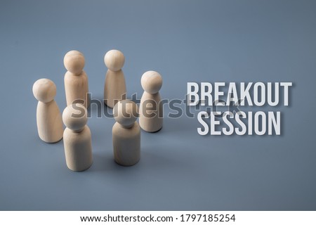 Breakout session concept. Wooden figure circle with text.