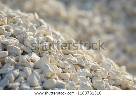 Breakstone background. Road gravel. Gravel texture. Crushed Gravel background. Piles of limestone rocks. Break stones on construction site.