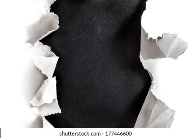 Breakthrough paper hole with blackboard background.