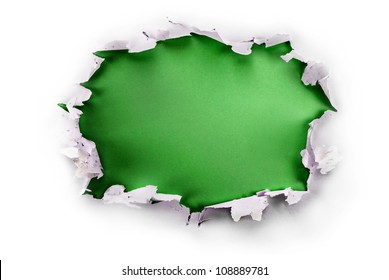 Breakthrough paper hole with green background, isolated on white.