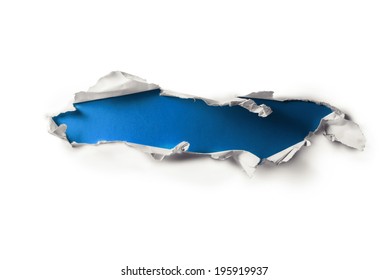 Breakthrough paper hole isolated on white.