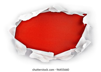 Breakthrough paper hole with red background.