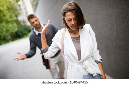 Breakup Of Couple With Man And Sad Girlfriend Outdoor. Divorce, Couple, Love, Pain Concept.