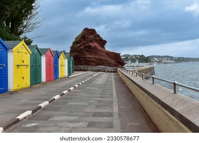 The breakwater and colourful beach huts at Coryton Cove Dawlish. - Powered by Shutterstock