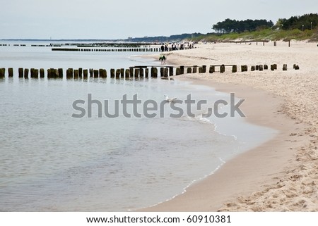 Breakwaters are structures constructed on coasts as part of coastal defence or to protect an anchorage from the effects of weather and longshore drift