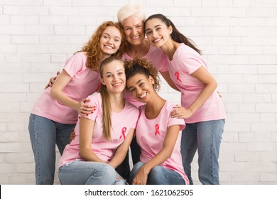 Breast Cancer. Group Of Multiracial Women In Pink T-Shirts With Ribbons Posing Over White Brick Wall - Shutterstock ID 1621062505