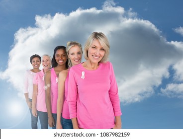 Breast cancer women with sky clouds background - Shutterstock ID 1087982159
