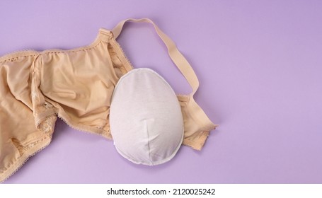 Breast Prosthesis Before Inserting It Into The Special Bra. Breast Prosthesis And Post Surgery Bra For Breast Cancer Patient After Mastectomy.