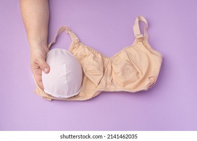 Breast Prosthesis Before Inserting It Into The Special Bra. Breast Prosthesis And Post Surgery Bra For Breast Cancer Patient After Mastectomy