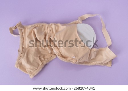 Breast prosthesis inserting into special bra. Breast prosthesis and post surgery bra for breast cancer patient after mastectomy