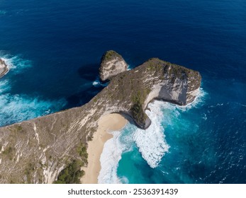 A breathtaking aerial view of a cliffside beach with turquoise waters. - Powered by Shutterstock