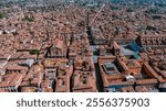 A breathtaking aerial view of Bologna’s historic heart featuring Piazza Maggiore, the Two Towers, and stunning medieval architecture, showcasing the charm of Italy’s cultural heritage.