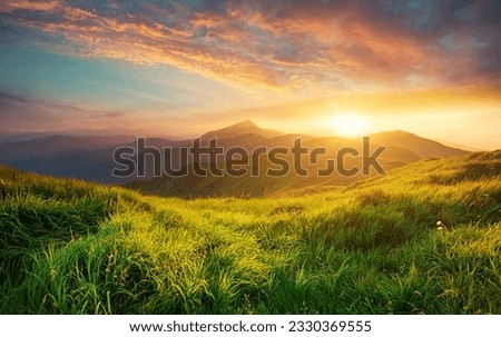 The breathtaking beauty of nature with this stunning mountain landscape scenery stock photo. As the sun sets, it casts a warm golden glow over the majestic peaks, creating a mesmerizing scene. 