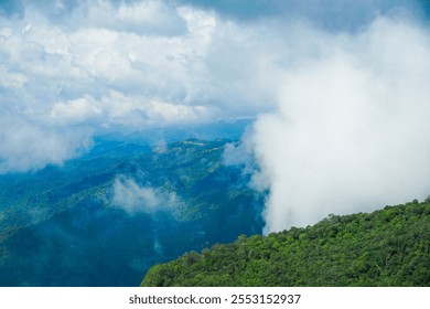 Breathtaking cloud-covered mountain landscape nature reserve aerial view lush greenery adventure and tranquility - Powered by Shutterstock