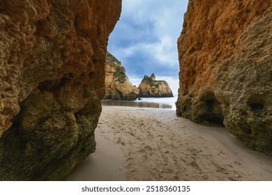 Breathtaking coastal scene with rugged cliffs, natural arches, and caves set against a dynamic cloudy sky - Powered by Shutterstock