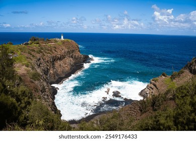 Breathtaking coastal view of a rugged cliffside with a lighthouse perched atop, surrounded by the deep blue ocean and white waves crashing below - Powered by Shutterstock