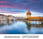 Breathtaking historic city center of Lucerne with famous buildings and old wooden Chapel Bridge (Kapellbrucke). Popular travel destination .  Location: Lucerne, Canton of Lucerne, Switzerland, Europe