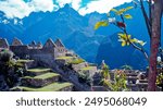 A breathtaking panoramic view of the iconic Machu Picchu ruins nestled amidst the majestic Andes Mountains in Peru.  Perfect for travel, history, and adventure projects.