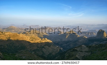 Breathtaking panoramic view of the Simien Mountains National Park in the Ethiopian Highlands under a clear blue sky