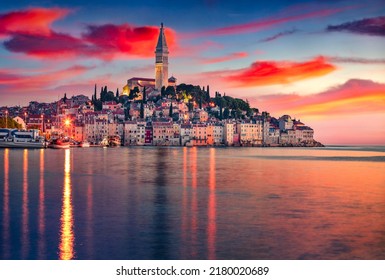 Breathtaking summer sunset on Rovinj town, Croatian fishing port on the west coast of Istrian Astonishing seascape of Adriatic Sea. Traveling concept background.