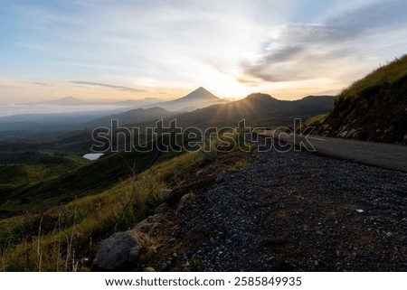 Image, Stock Photo Misty sunrise over winding road in La Mancha, Spain