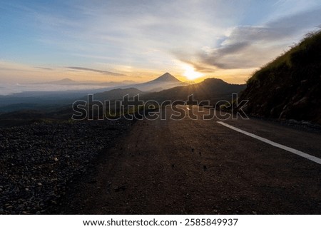 Similar – Image, Stock Photo Misty sunrise over winding road in La Mancha, Spain