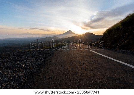 Similar – Image, Stock Photo Misty sunrise over winding road in La Mancha, Spain